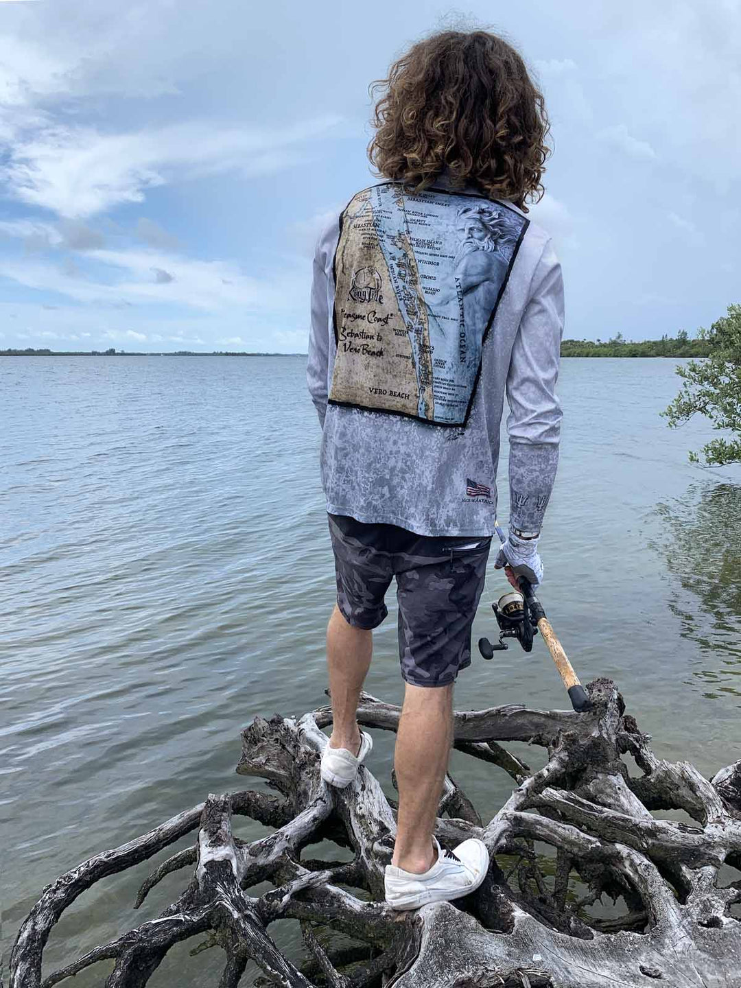 Vintage style, nautical chart  of Vero Beach on back of long sleeve performance shirt with slate fossil allover print. UPF 50. XS-5X. Made in USA. Original art and design by Tal Willis.
