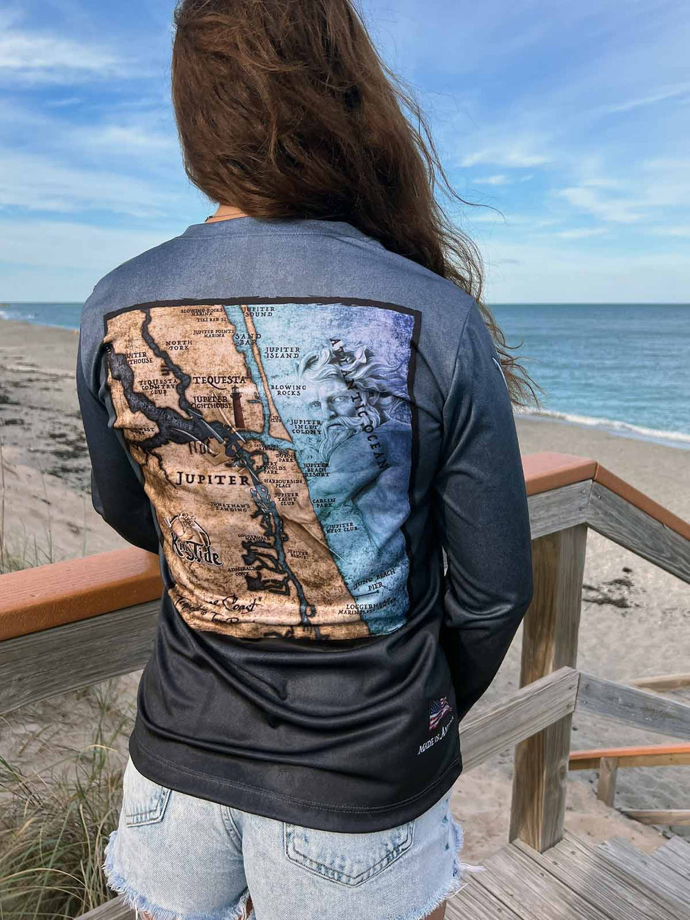 Serene Black, long sleeve  performance shirt. Back features vintage style Jupiter, FL coastal map. UPF 50. XS-2X. Made in USA. Original art and design by Tal Willis.