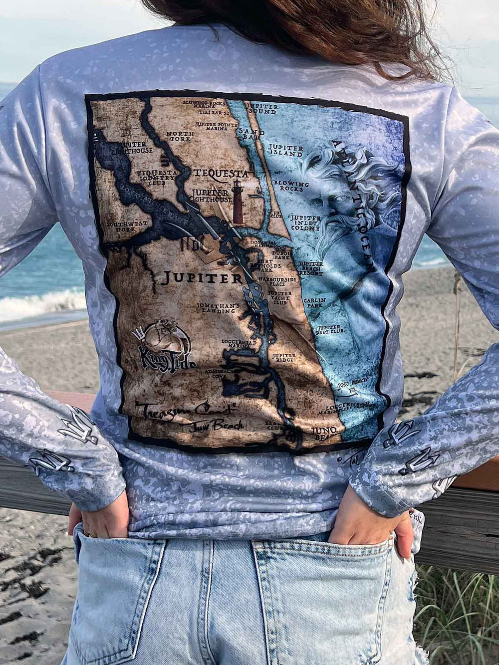 King Tide long sleeve performance shirt in serene black.  Back side features vintage style map of coastal Jupiter, FL. UPF50 XS-2X Made in USA. Original artwork and design by Tal Willis.