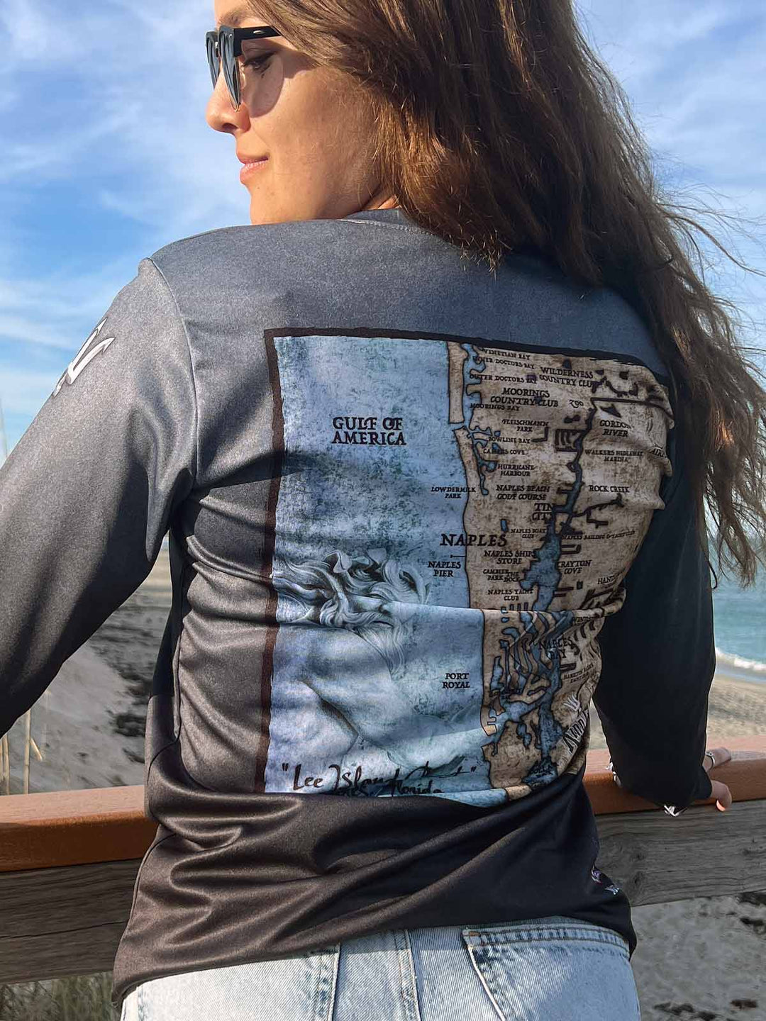 Naples, FL coastal map vintage style on long sleeve serene black performance shirt. UPF 50 XS-2X
