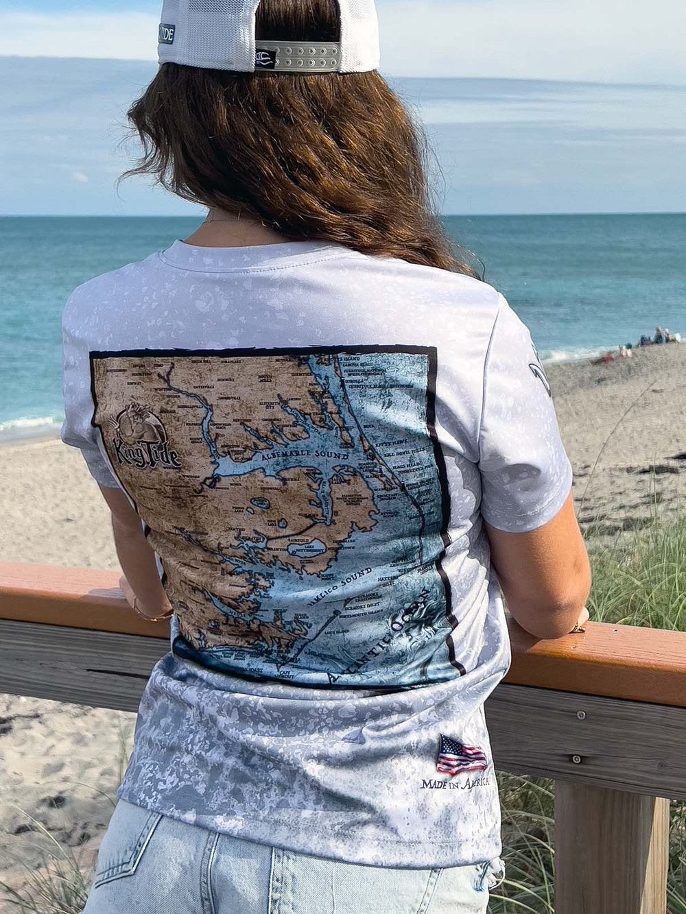 Slate fossil print short sleeve V neck performance shirt with vintage style, coastal map of the Outer Banks on the back.  UPF 50. XS-4X. Made in USA. Original art & design by Tal Willis.