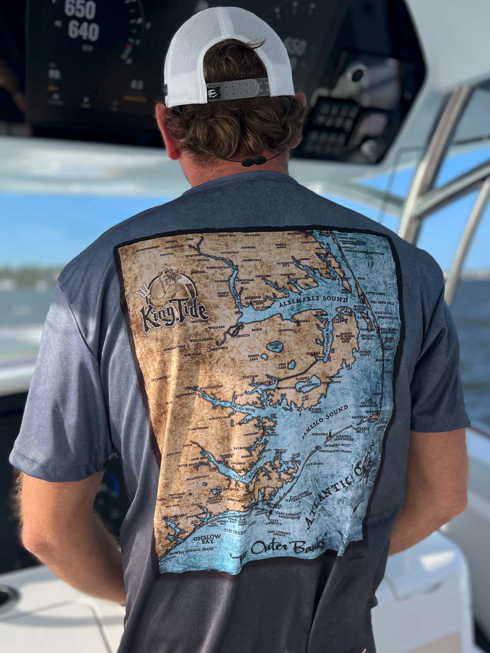 Short sleeve, serene black allover print performance shirt. Back shows vintage style map of the Outer Banks. UPF 50. XS-5X. Made in USA. Original art and design by Tal Willis. 