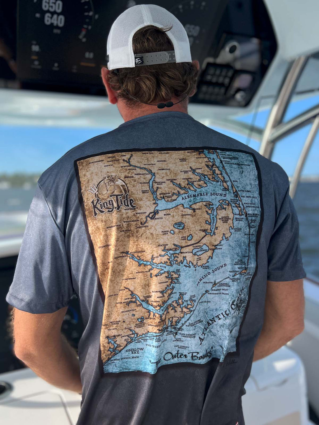 Short sleeve, serene black allover print performance shirt. Back shows vintage style map of the Outer Banks. UPF 50. XS-5X. Made in USA. Original art and design by Tal Willis. 