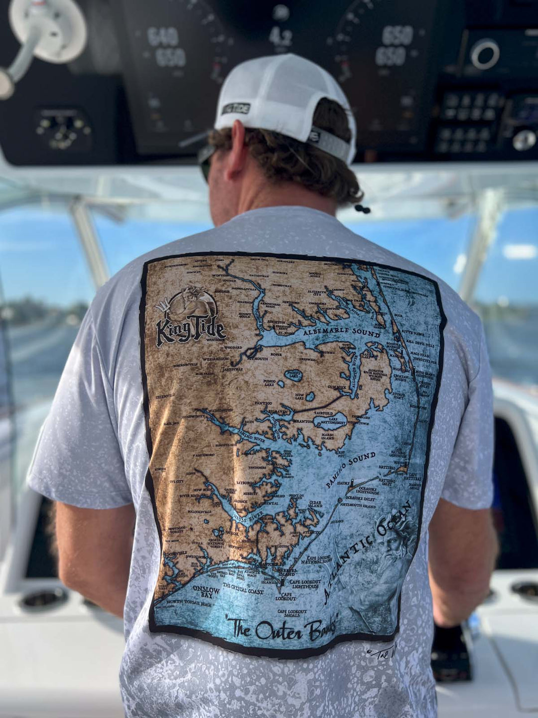 Vintage style map of THE OUTER BANKS on back of short sleeve performance shirt with slate fossil allover print. UPF 50. XS-5X. Made in USA. Original art and design by Tal Willis.

