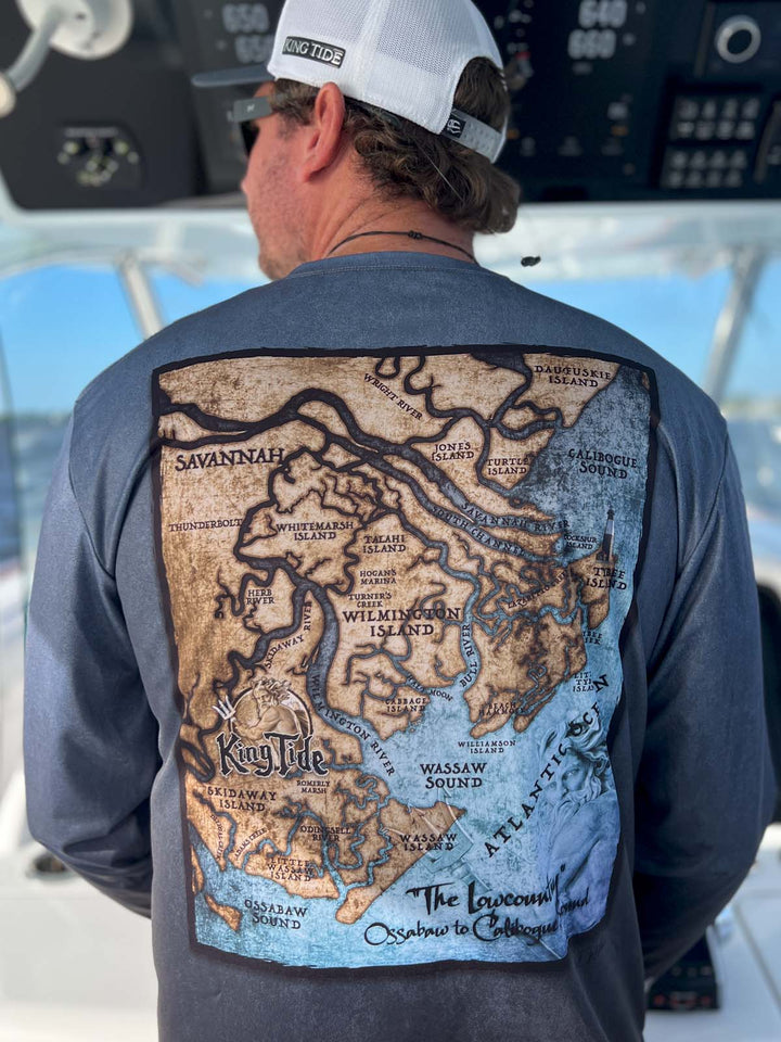 Long sleeve, serene black allover print performance shirt. Back shows vintage style map of the Outer Banks. UPF 50. XS-5X. Made in USA. Original art and design by Tal Willis. 