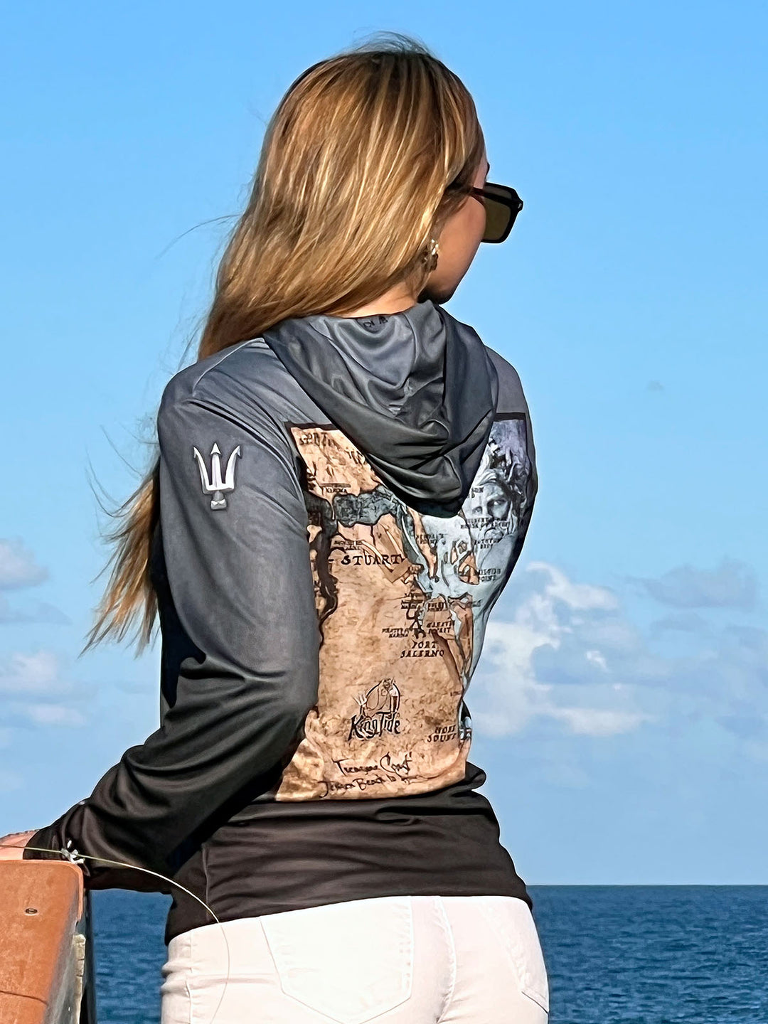 Vintage style Stuart, FL coastal map on back of serene black performance hoodie.  Double lined hood. UPF50. Unisex. XS-4X. Made in USA. Original art and design by Tal Willis.