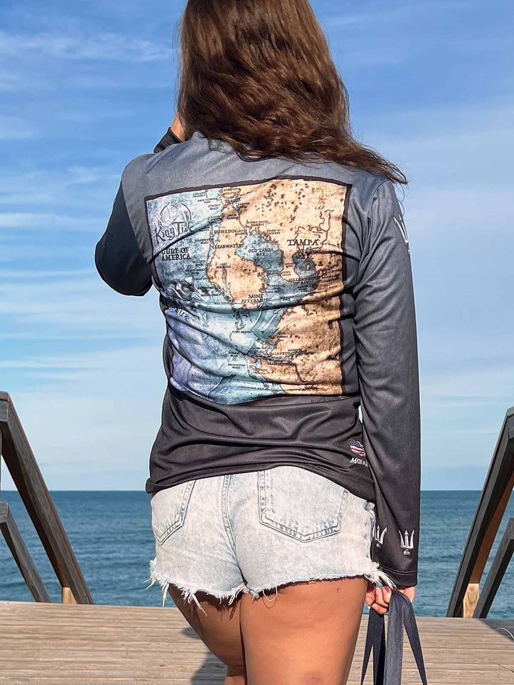 vintage style Tampa coastal map sits on the back side of a  serene black, long sleeve performance shirt. UPF50 XS-2X. Made in USA. Original art and design by Tal Willis