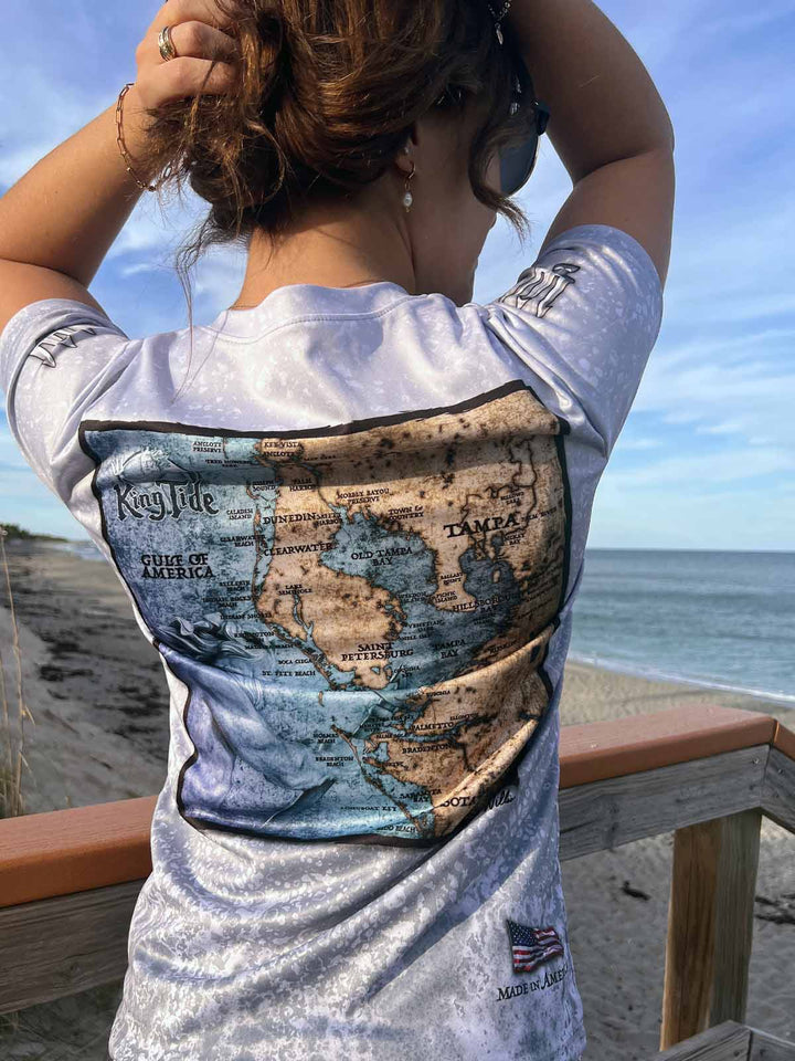 Short sleeve, slate fossil print performance shirt. Vintage style Tampa coastal map on back. Trident on sleeve. XS-4X. Made in USA