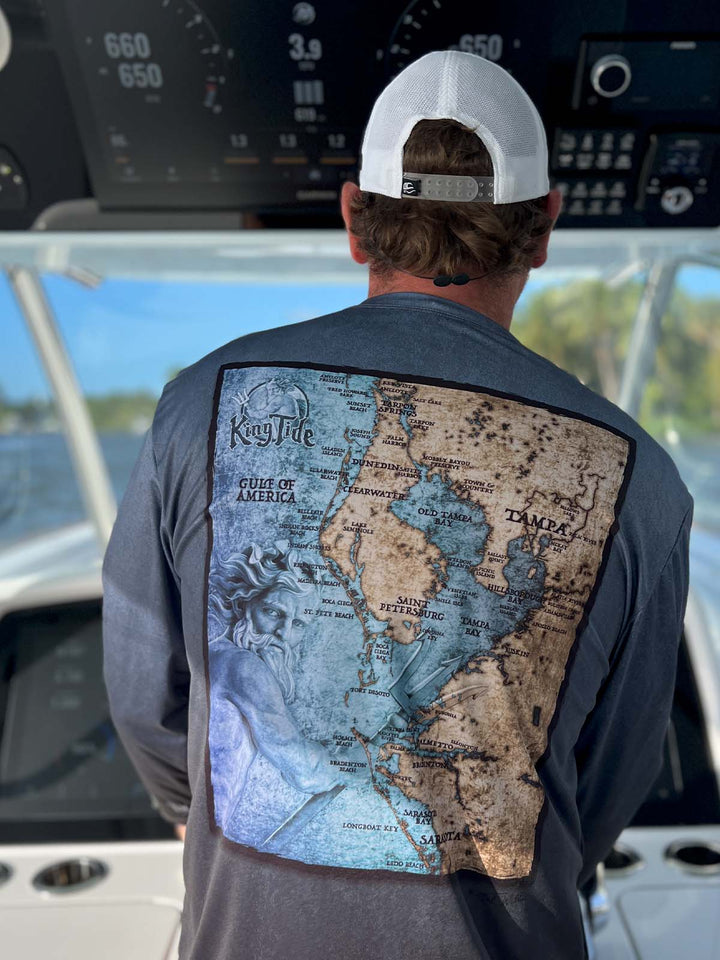 King Tide long sleeve performance shirt in serene black.  Back side features large vintage style map of Tampa Bay.  UPF50. XS-5X. Original art and design by Tal Willis.
